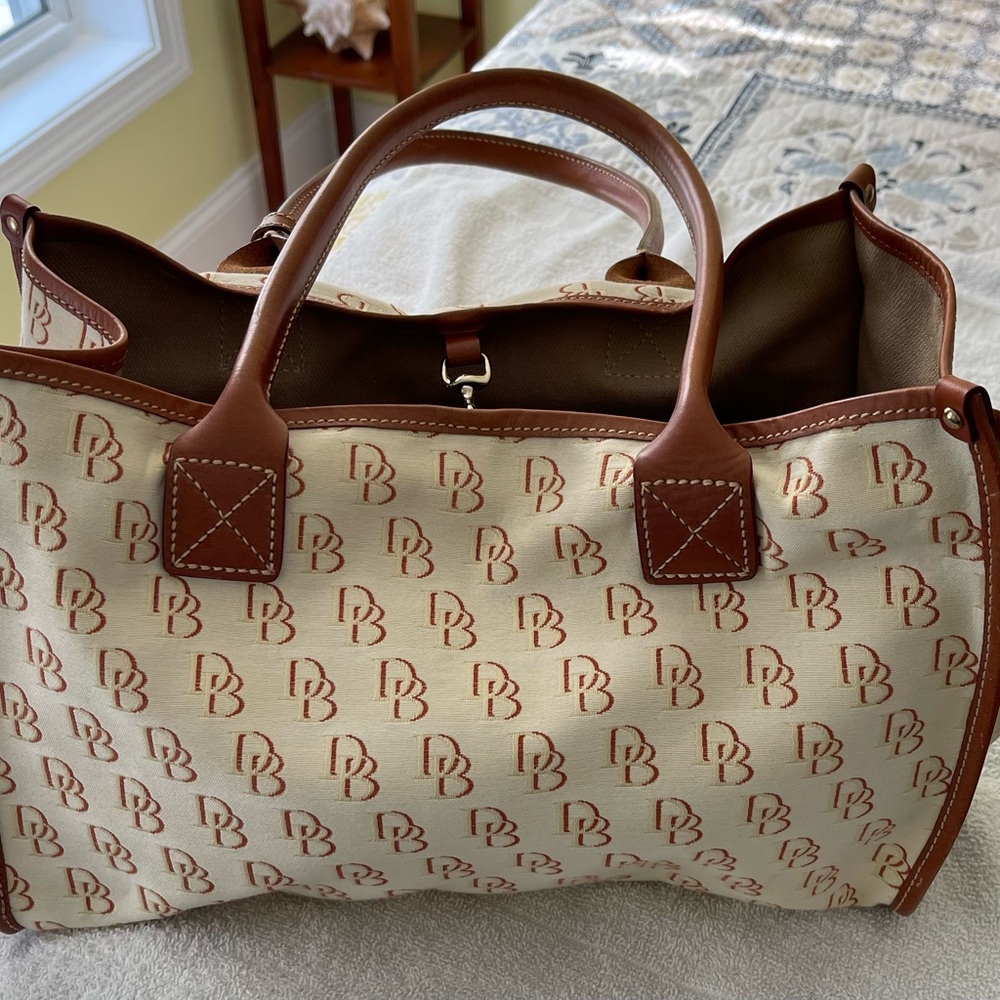 Dooney and Bourne cream with brown trim satchel bag